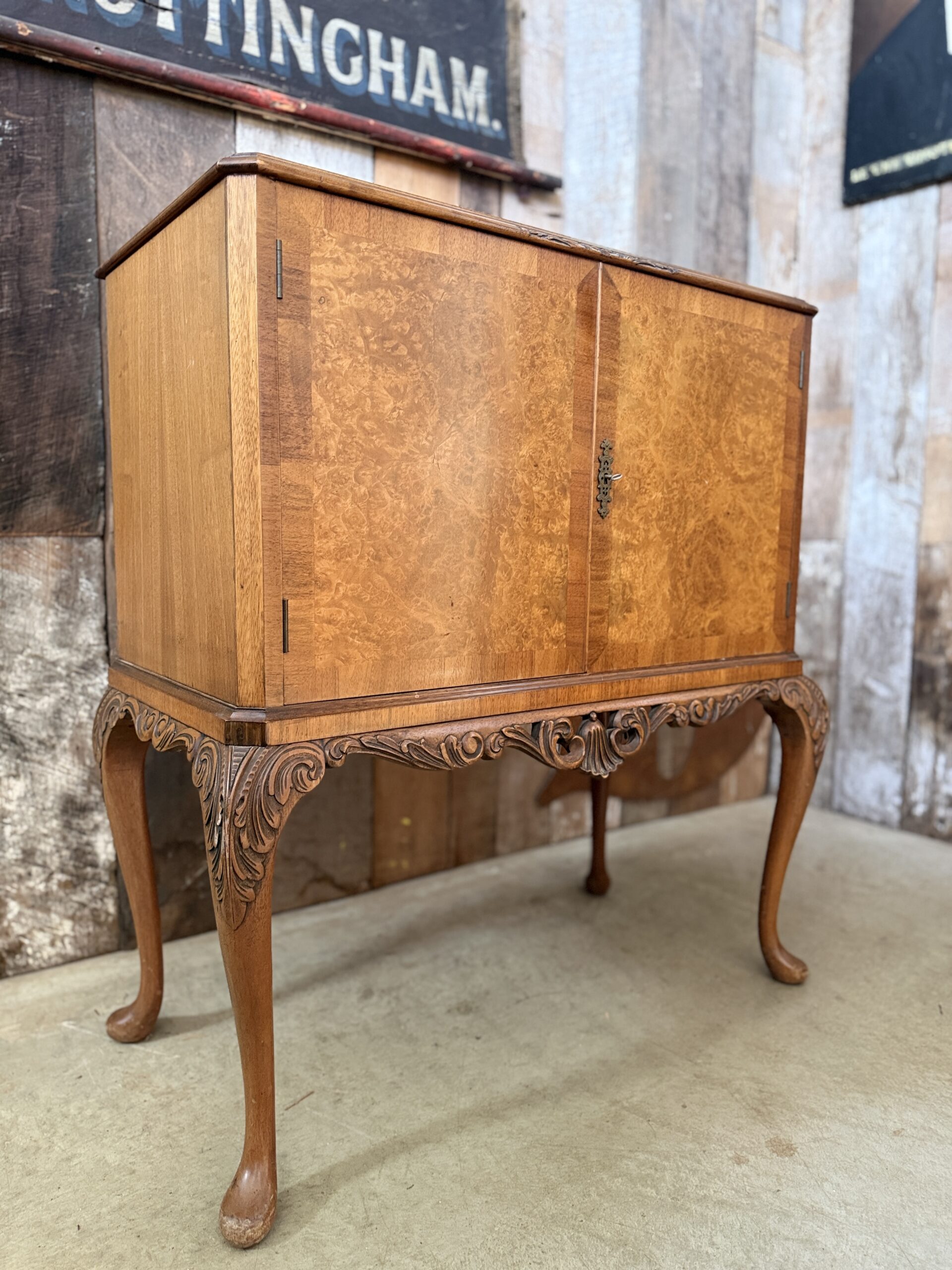 Vintage Art Deco burr walnut cocktail cabinet circa 1930 with fitted mirrored drinks interior and Woodmet serving trays