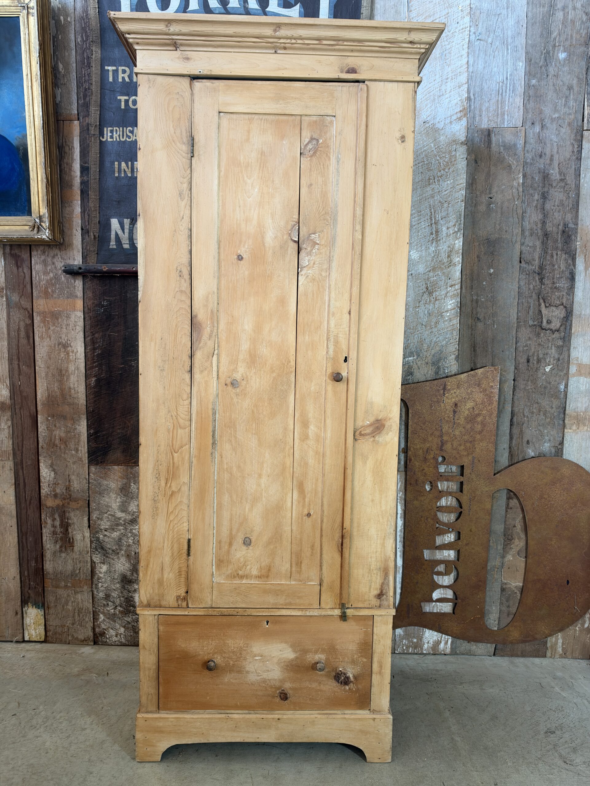 Antique Early Victorian tall pine single wardrobe with lower drawer, circa 1840